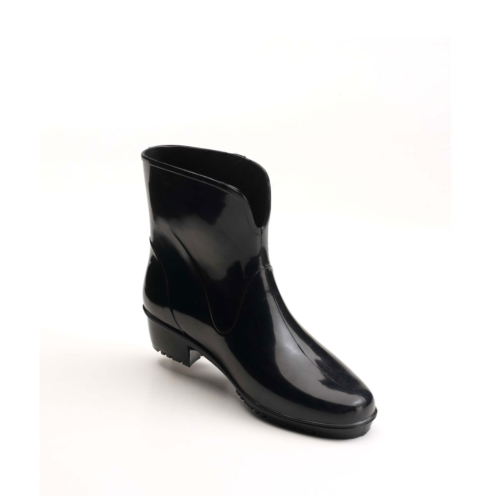 Solid colour ankle boot  in bright PVC, with heel and "V" necked upper, classic boot style