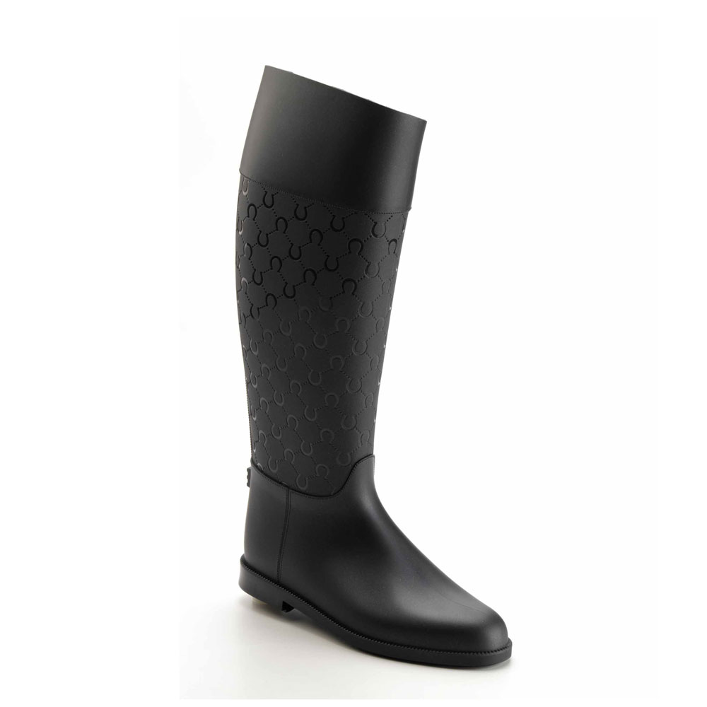 Riding boot in matt pvc with high boot leg featured by photoengraved quilt effect print 