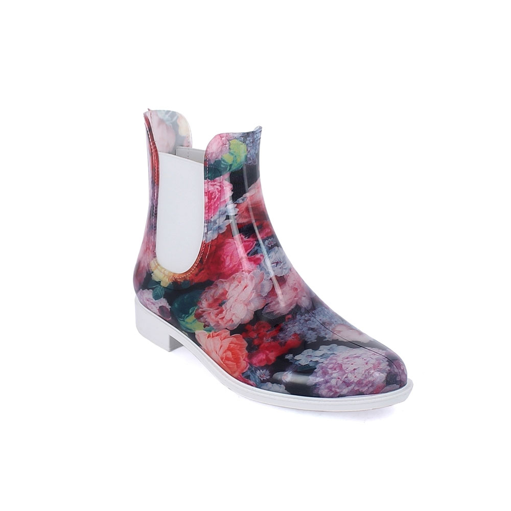 Chelsea boot in bright transparent pvc with elastic band on ankle sides and cut & Sewn lining with pattern "Ortensie". Made in Italy