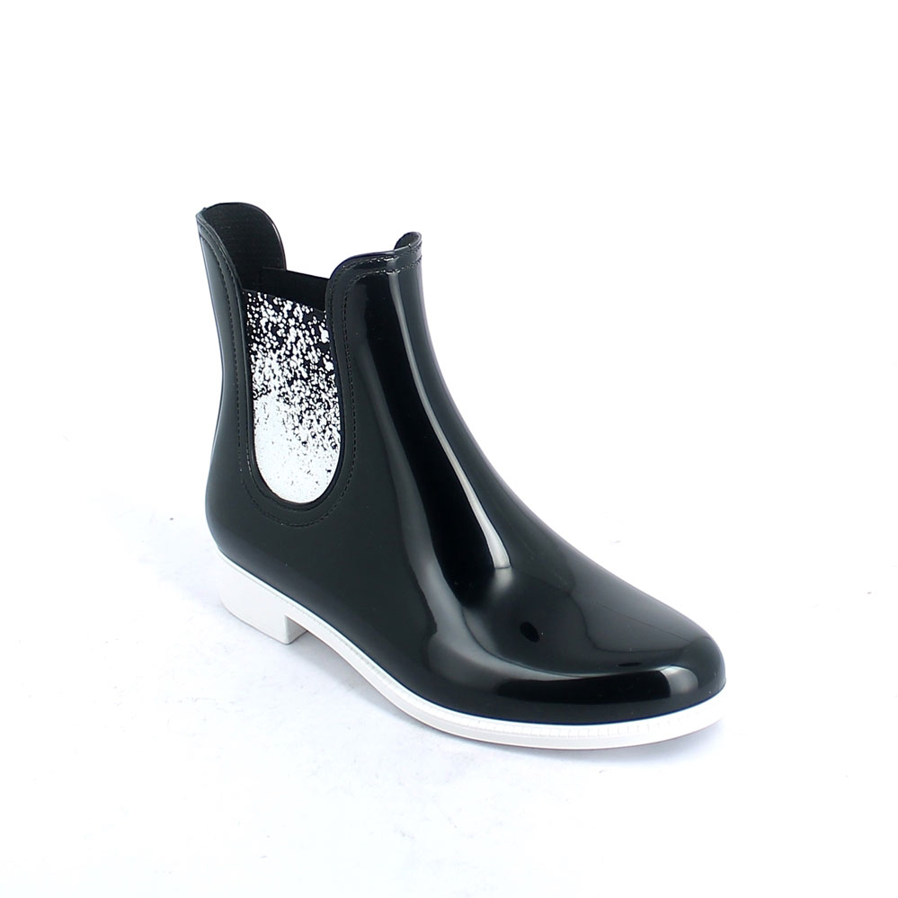 Chelsea boot in bright transparent pvc with sprayed elastic bands on ankle sides