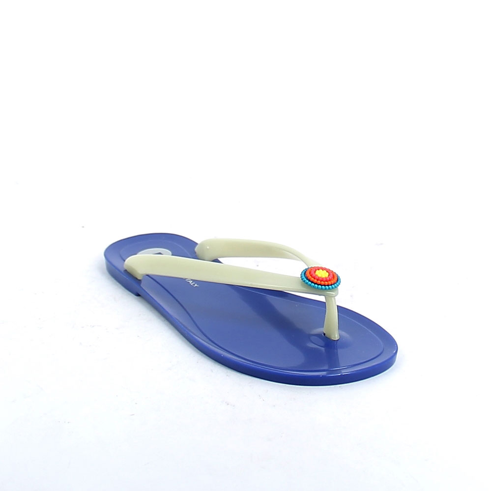 Pvc flip flop with luminescent upper and multicolour flower application; pad printing on the insole