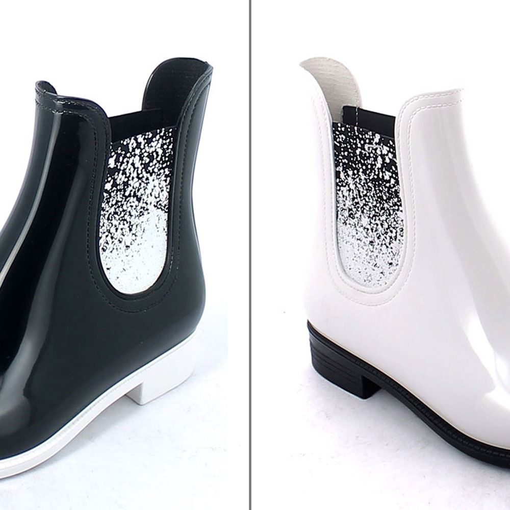 Black elastic band with embossed spray in colour white,sewn on a black&amp;white pvc low boot