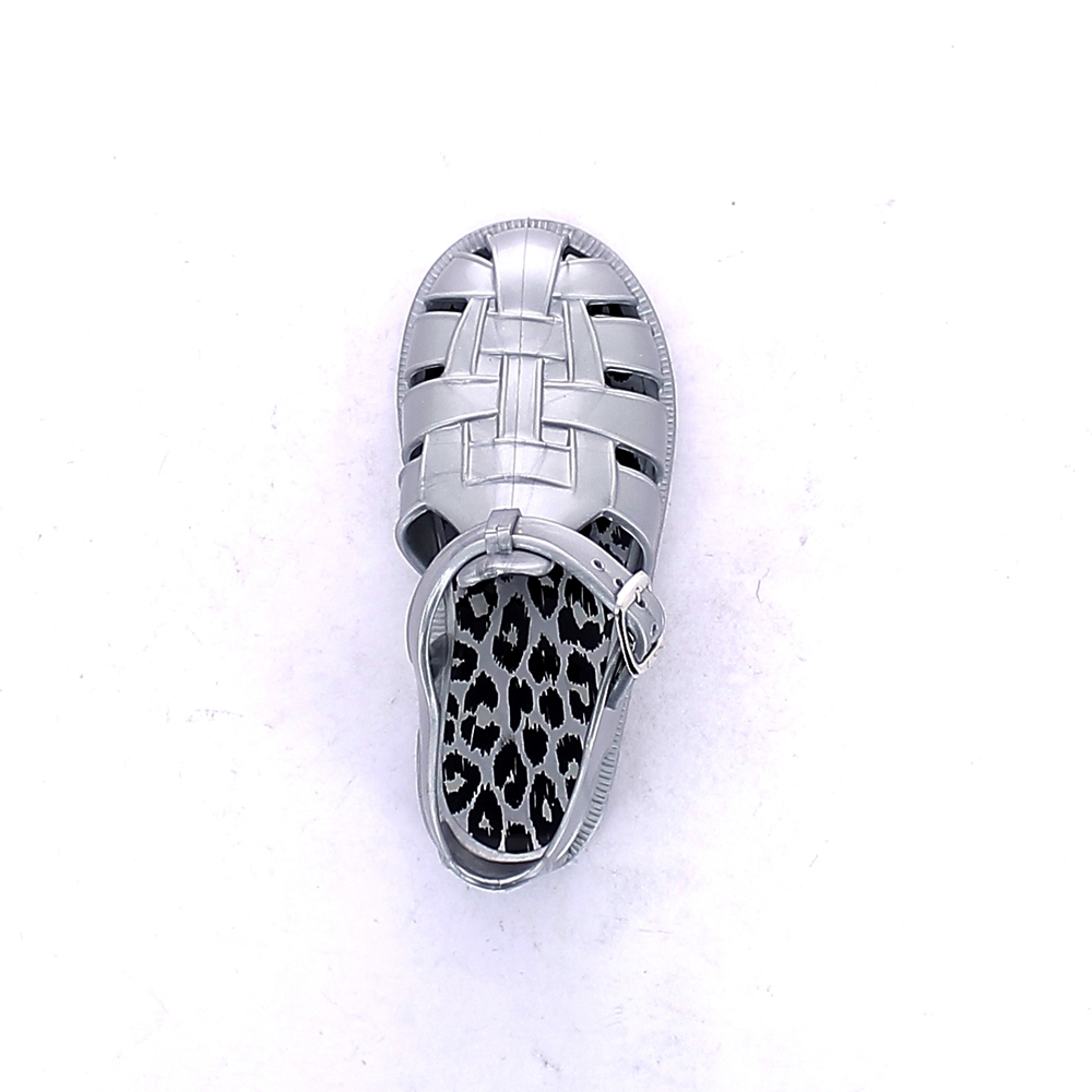 Leopard pattern electrostatic label applied on the insole of a children sandal in metalized silver colour